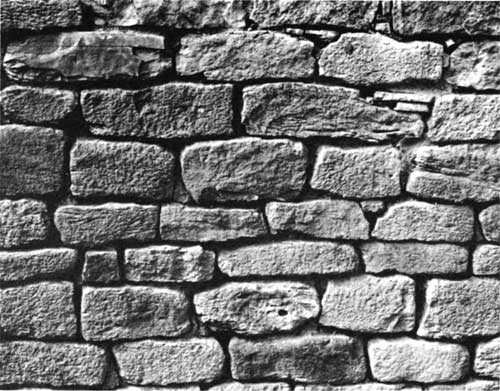 Mesa Verde-style masonry wall.
