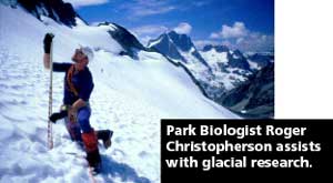Park Biologist Roger Christopherson assists with glacial research