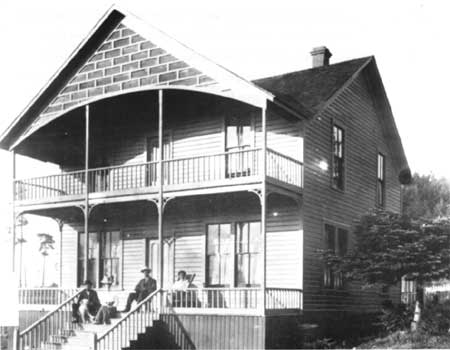 Crook family on the front porch of their house