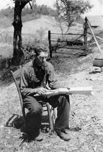 man inletting barrel into stock