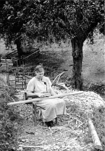 woman cutting rifling guide